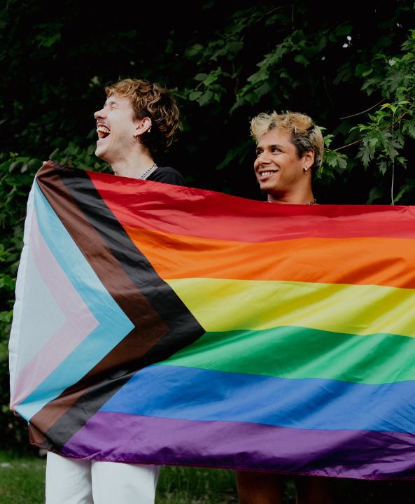 rangatahi holding pride flag