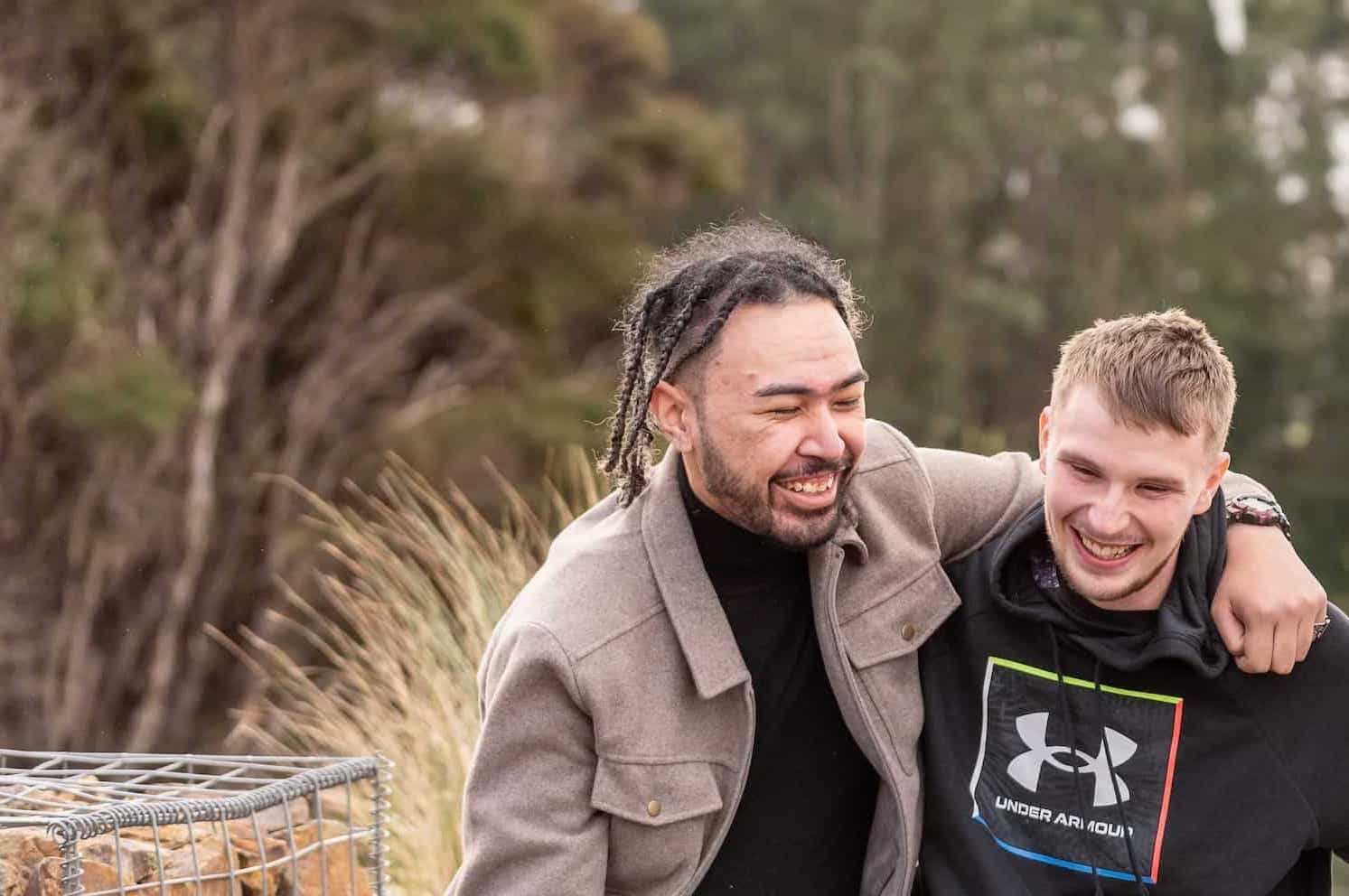 two young people smiling