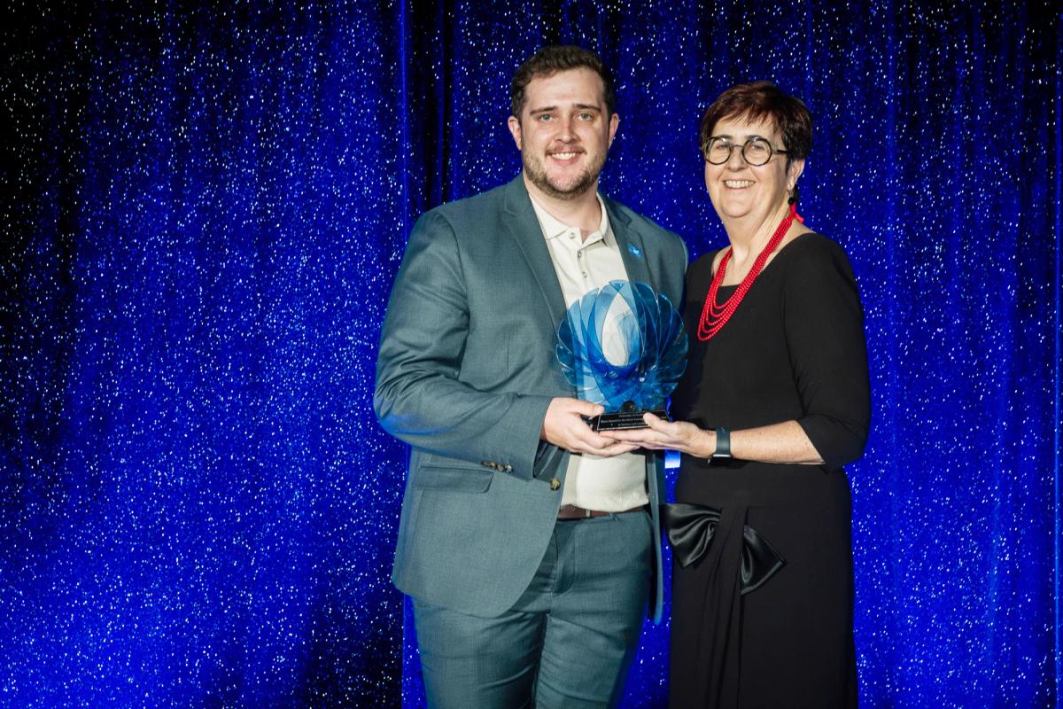 Josh receiving the Auckland University Blues Award