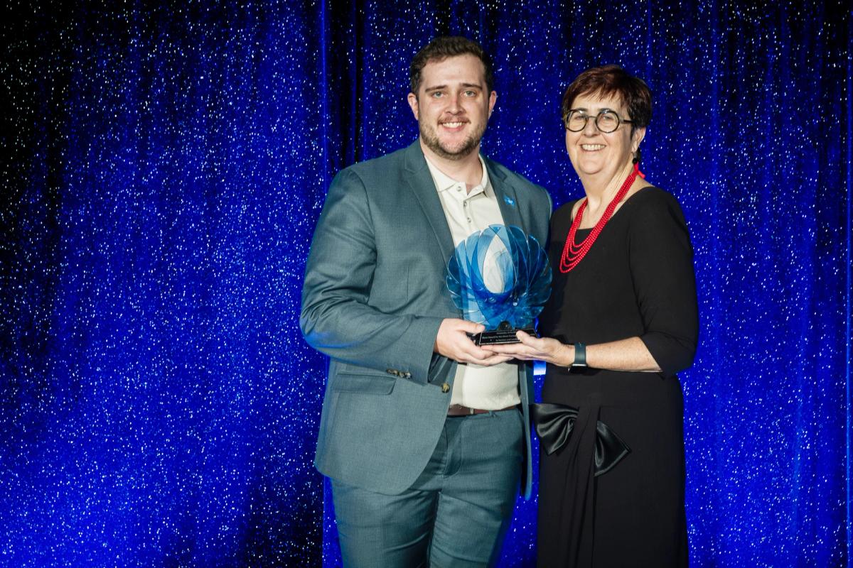 Josh receiving the Auckland University Blues Award