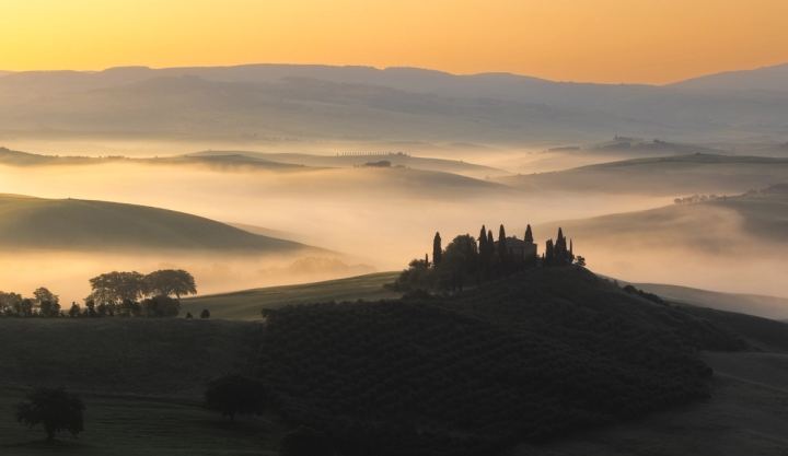 Tuscany farmhouse at sunset