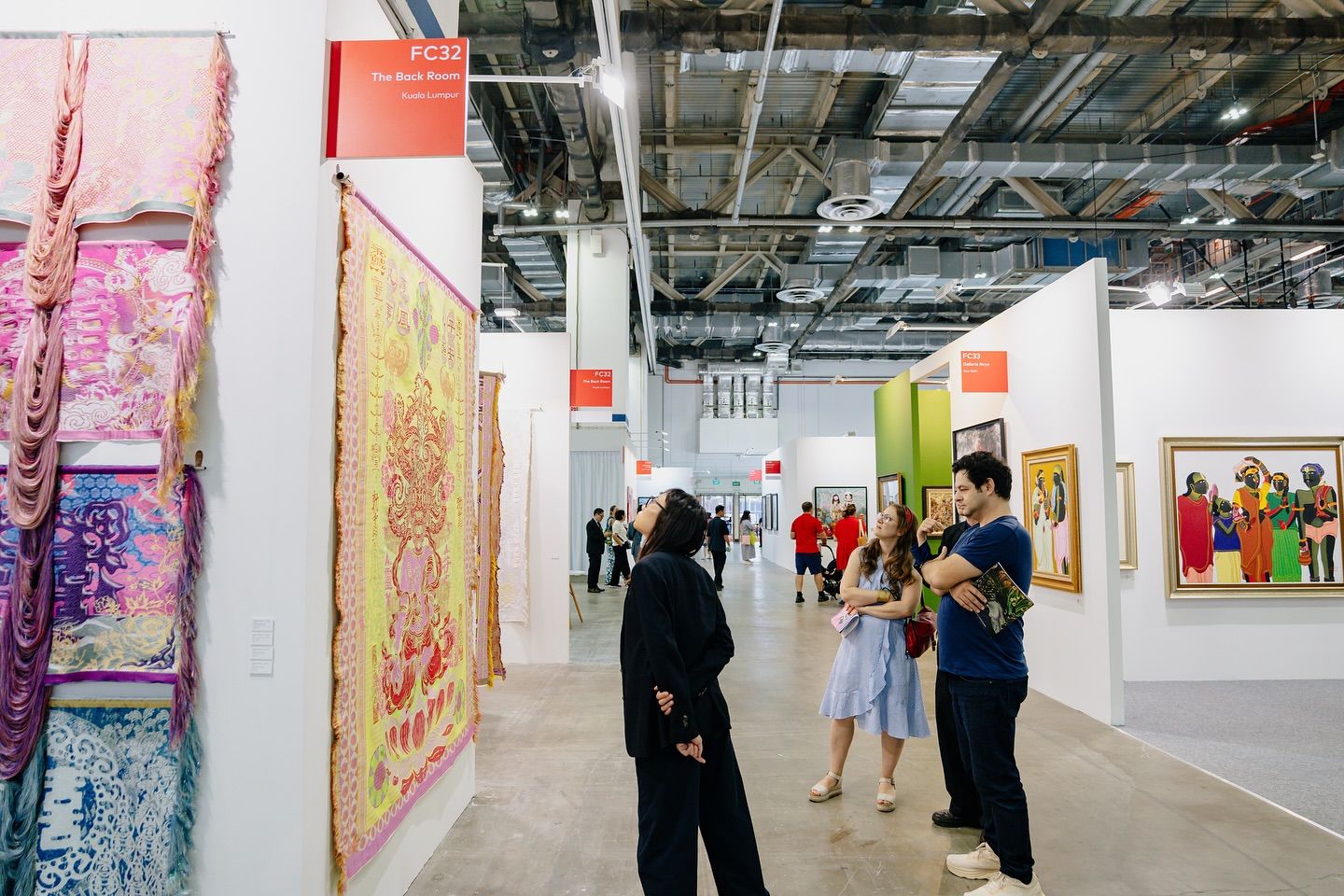 Visitors inside an ART SG exhibition space