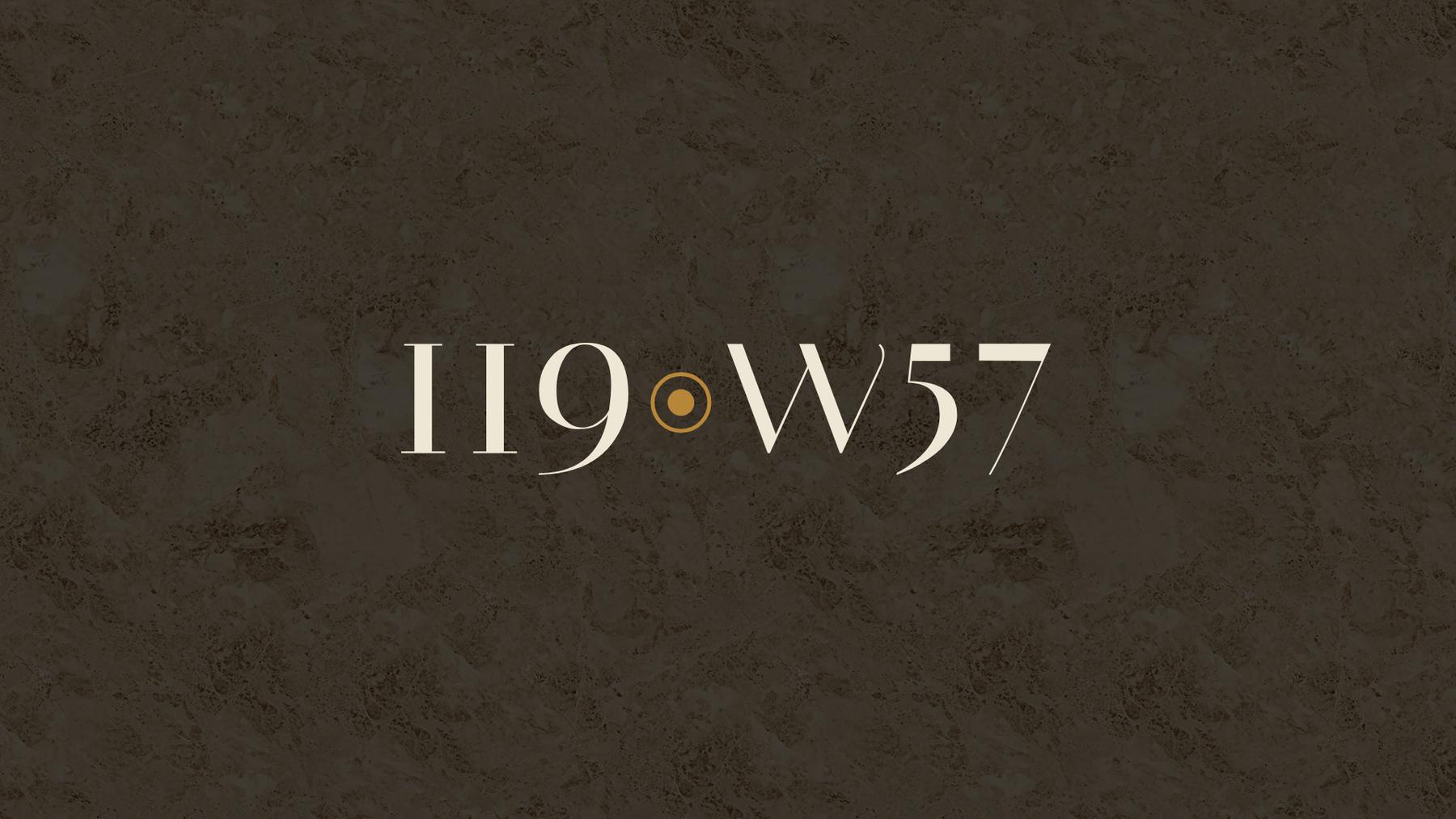 The 119 West 57th Street wordmark in parchment over a darkened marble texture drawn from the building's 1926 lobby