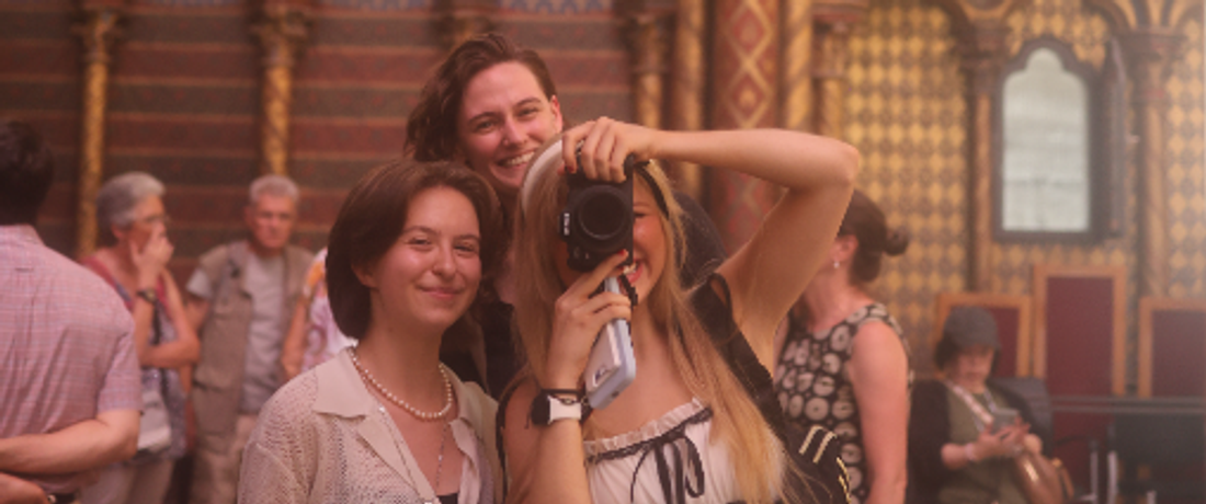 students taking pictures overseas