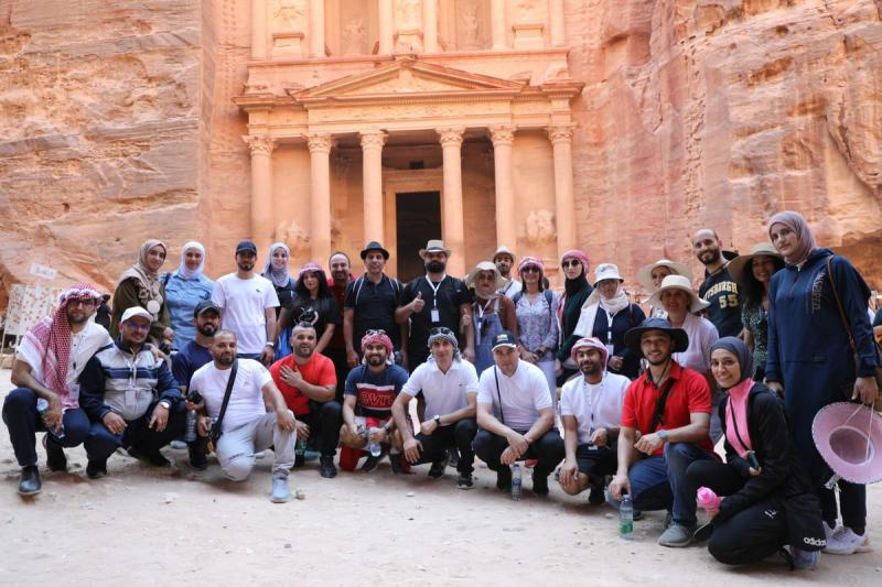 Dr. Al-Maswari with a tour group in Petra, Jordan.