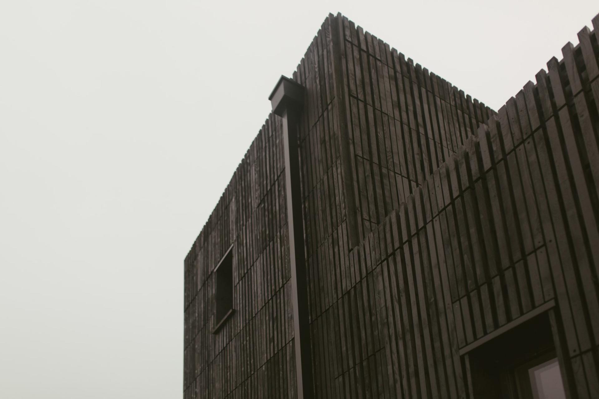This is an exterior photograph of Box House. It is made of U-Build in collaboration with Studio Bark and has been featured on the Grand Designs TV show.