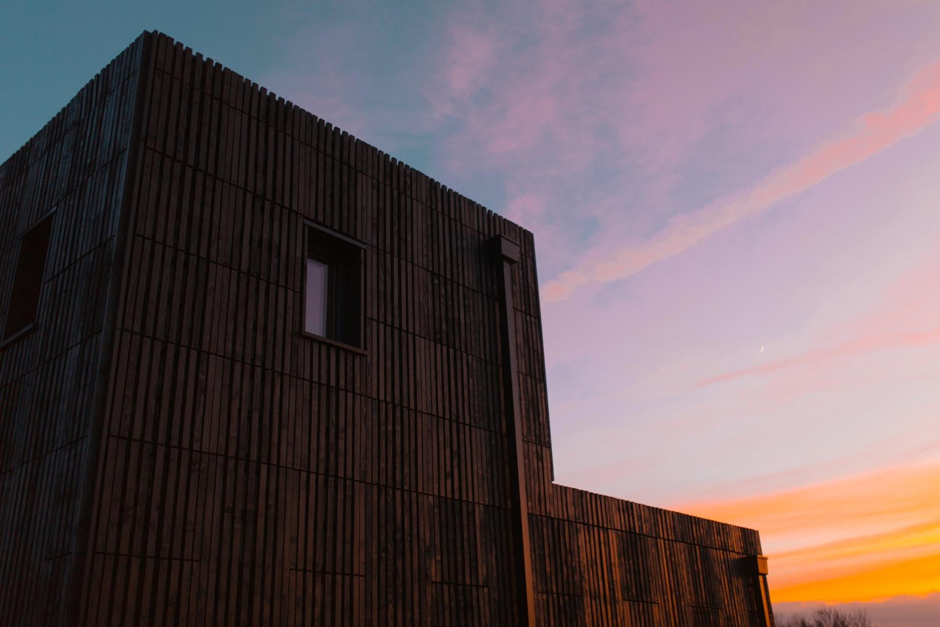 This is an exterior photograph of Box House. It is made of U-Build in collaboration with Studio Bark and has been featured on the Grand Designs TV show.