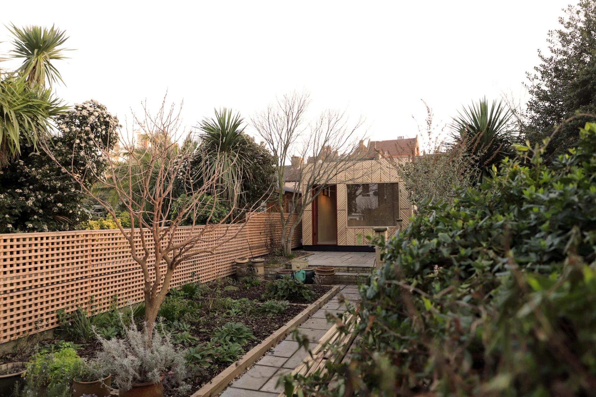 U-Build can be used for bespoke projects. This is an exterior photograph of a garden room in an East London garden