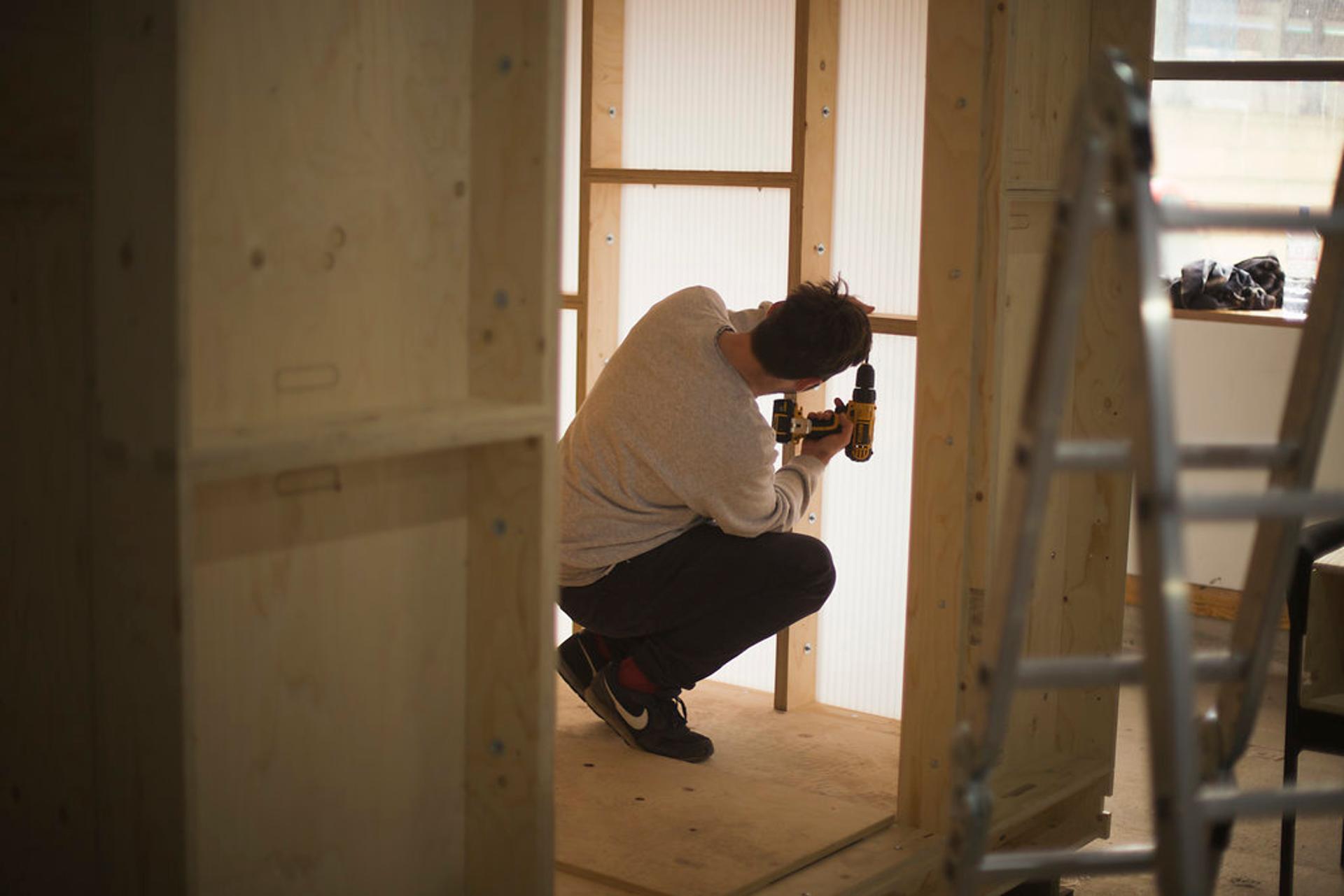 U-Build can be used for community projects - This is a picture of one of the community team building a U-Build structure