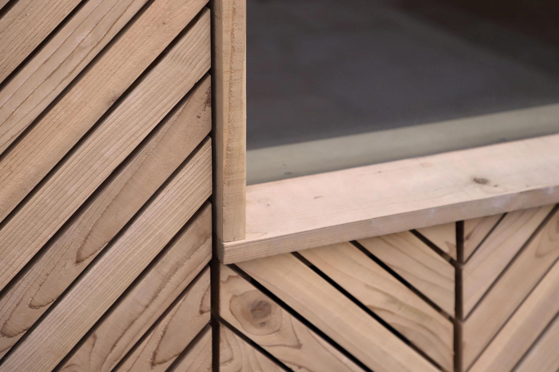 A detail exterior photograph of the window sill for a garden room in an East London garden
