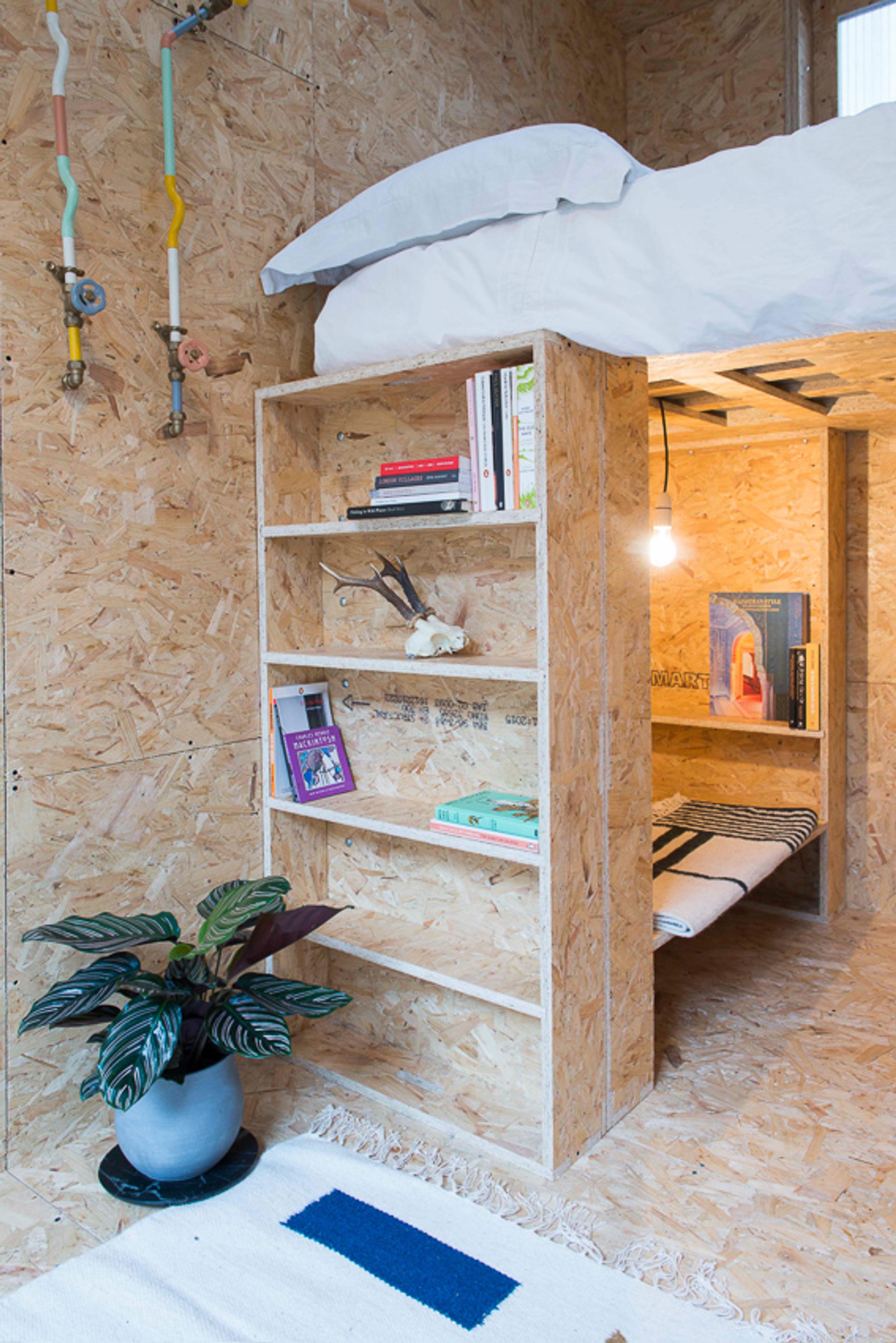 U-Build can be used for furniture and storage - This is a picture of a U-Build raised double bed with built in storage