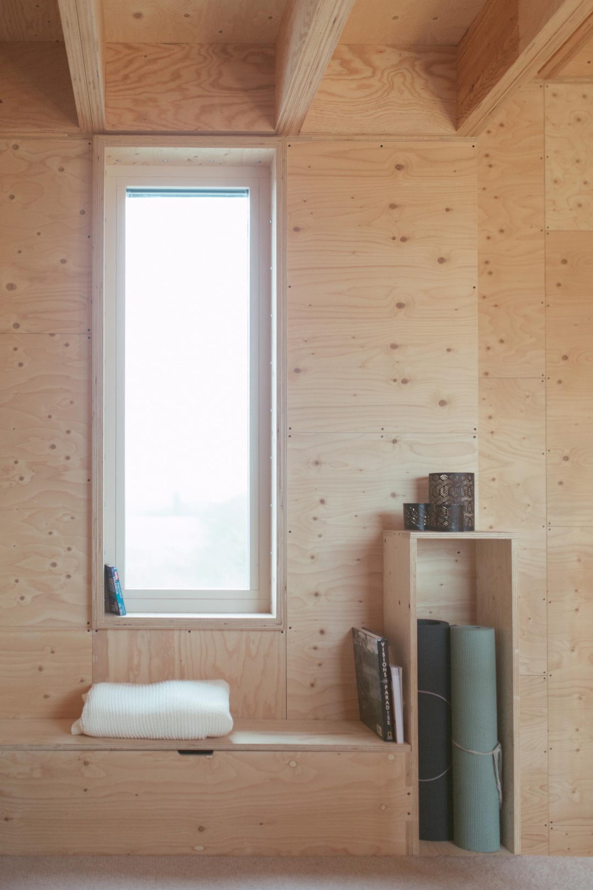 This is an interior landing photograph of Box House. It is made of U-Build in collaboration with Studio Bark and has been featured on the Grand Designs TV show.