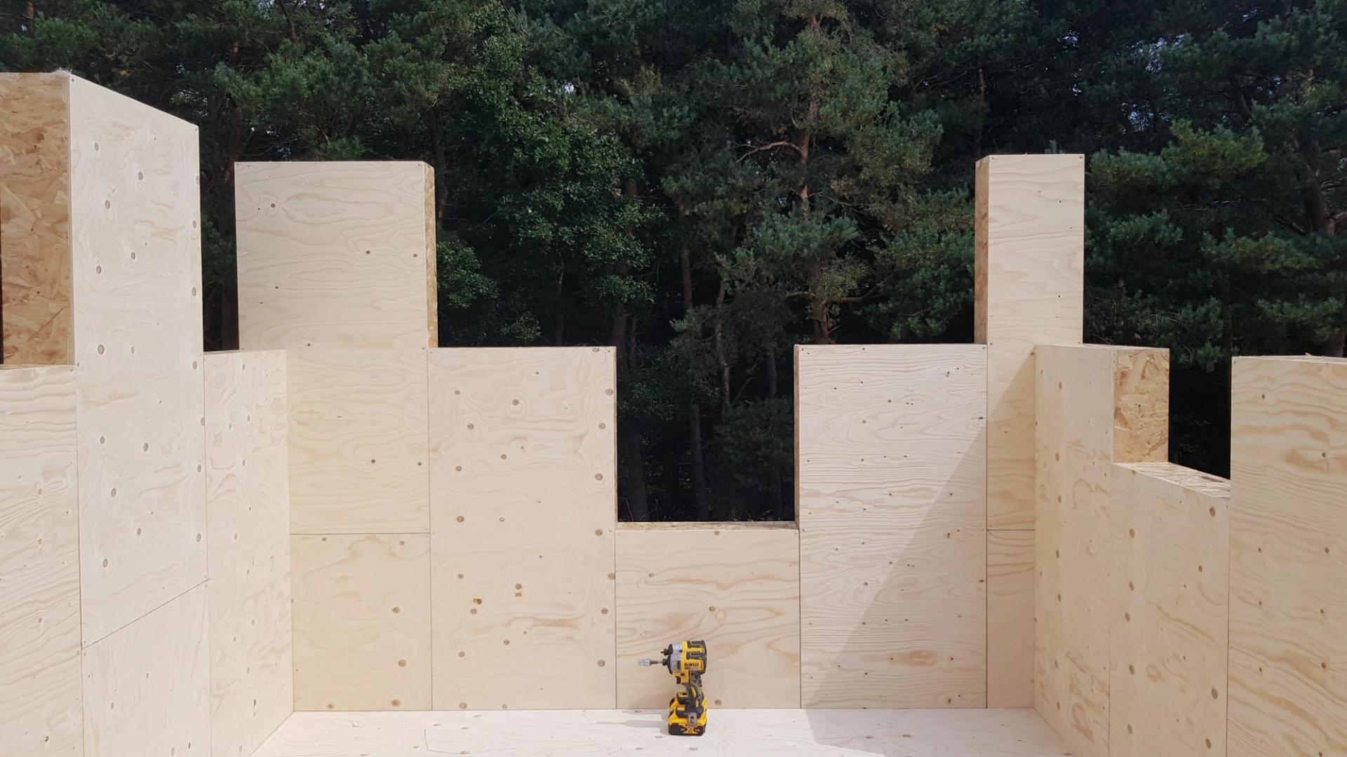 The start of a wooden wall