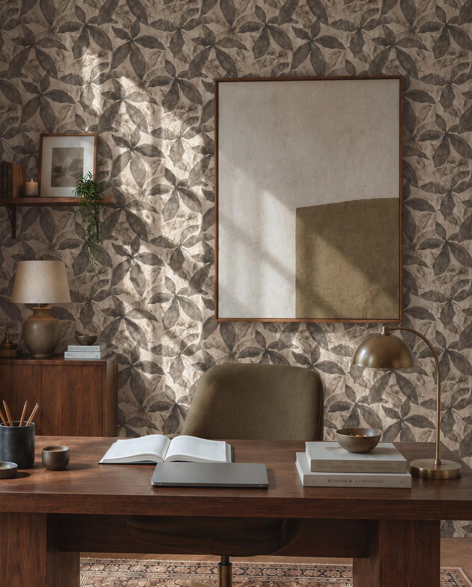 Cocoa Pressed Leaf wallpaper behind a walnut desk and wall mirror