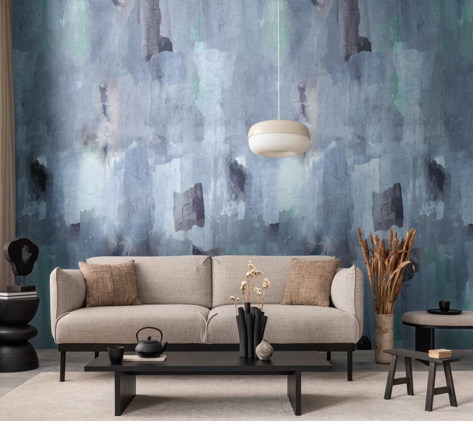 Indigo Fresco wall panel behind a grey sofa and low table