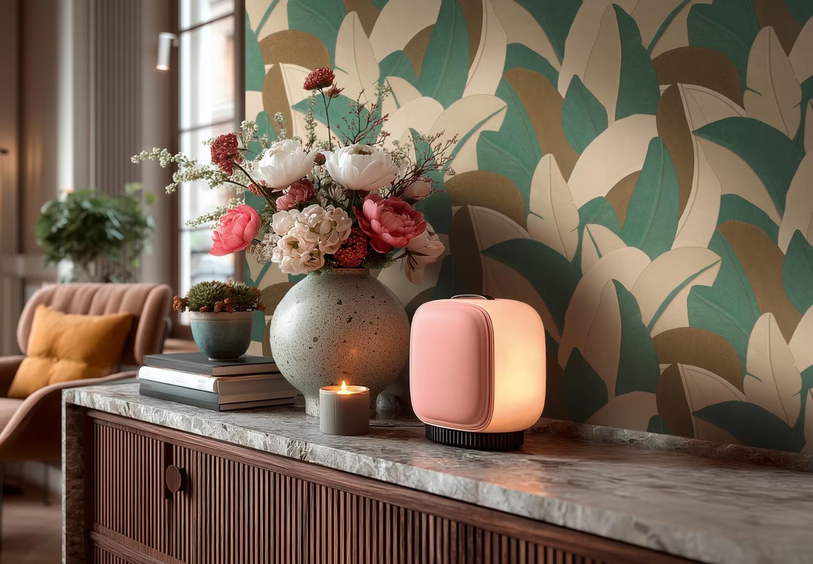 Emerald Banana Leaf wallpaper above a marble counter with flowers