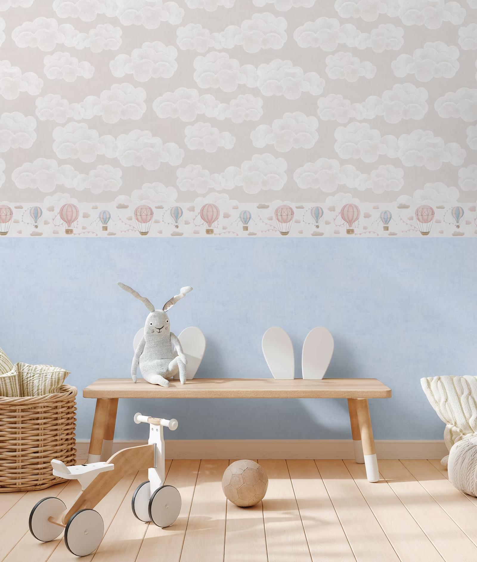 Balloon border above a blue dado in a child's room