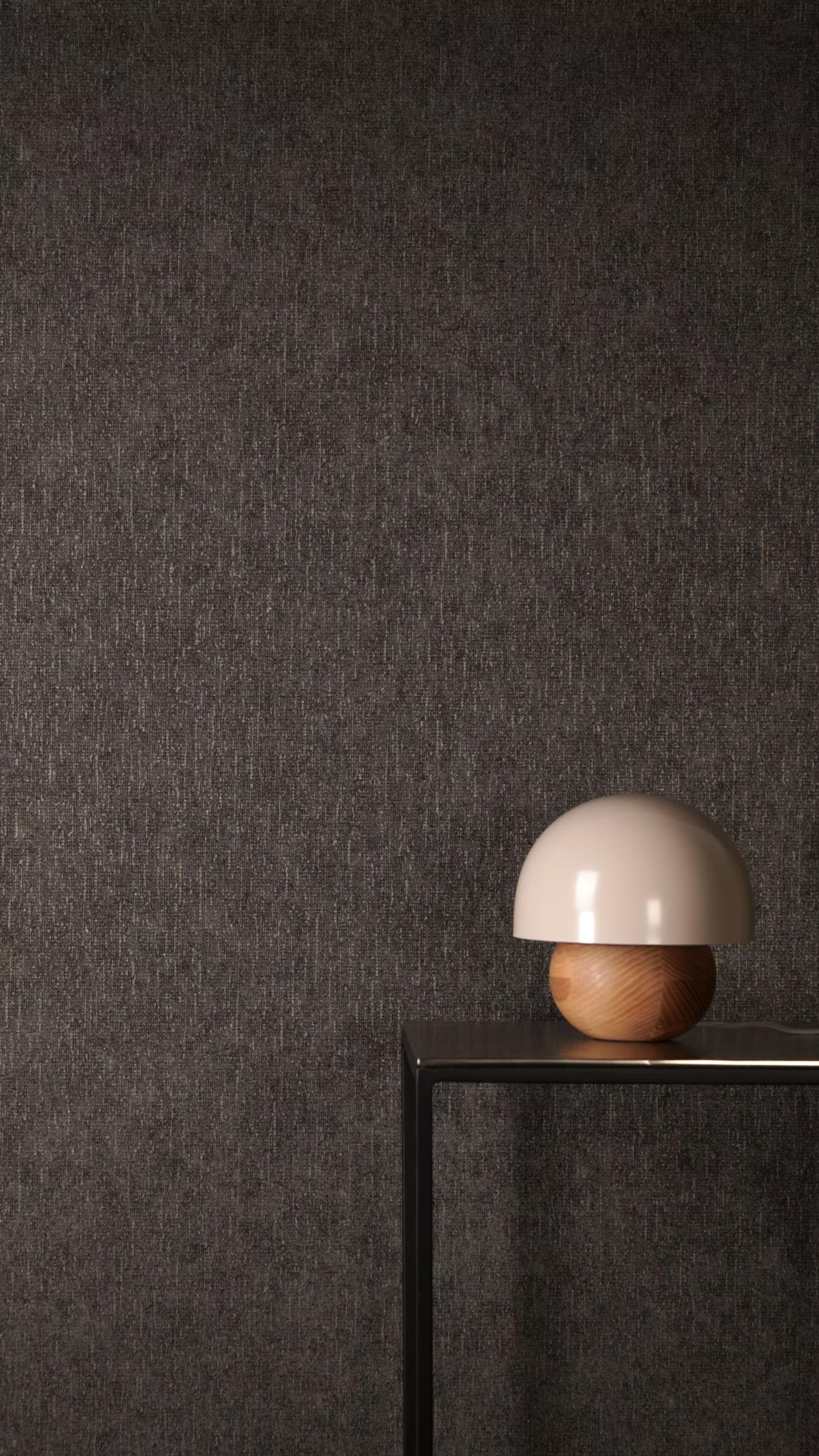 Espresso Strie plain wallpaper behind a side table and dome lamp