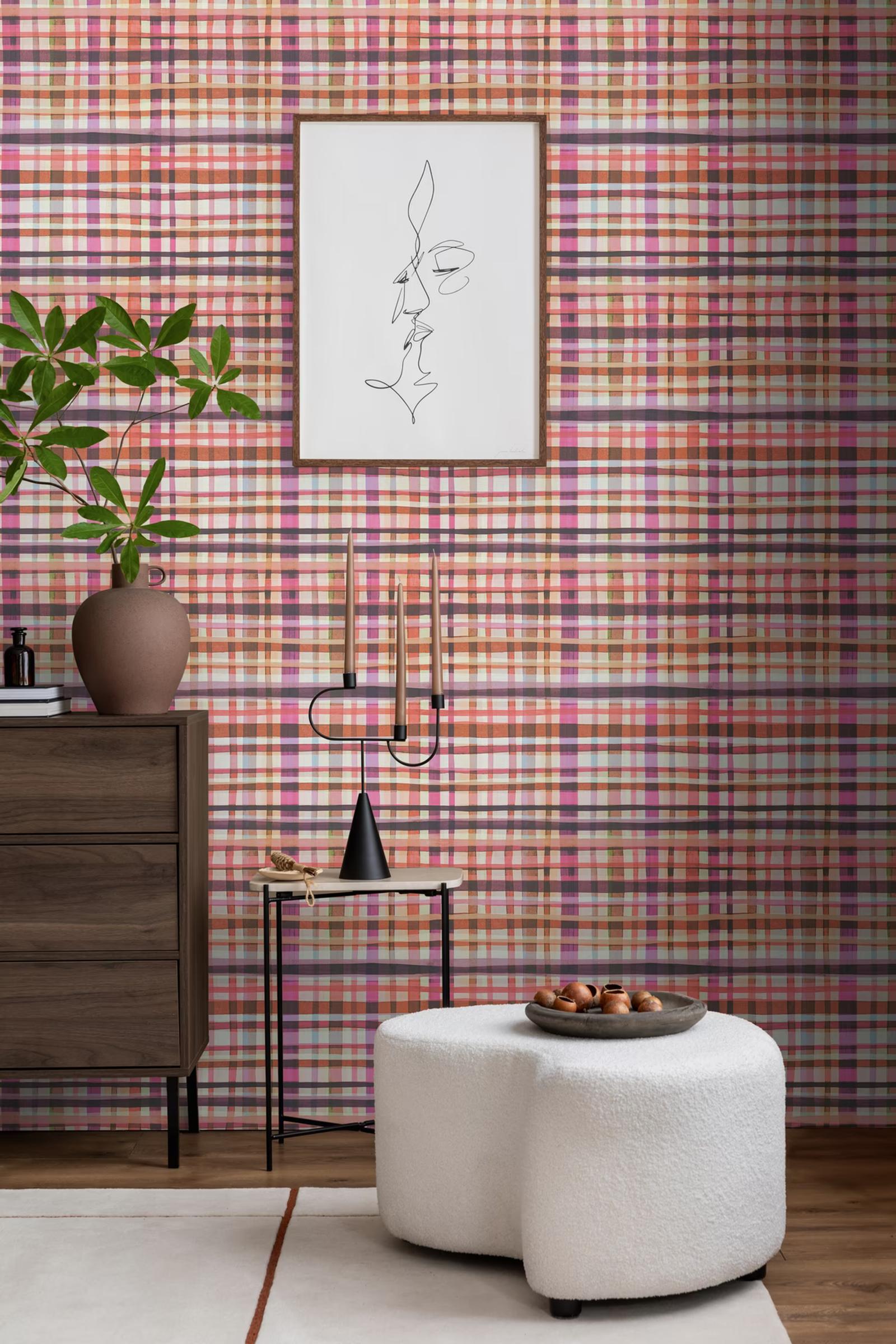 Coral Check wallpaper beside a dark chest and line-drawing print