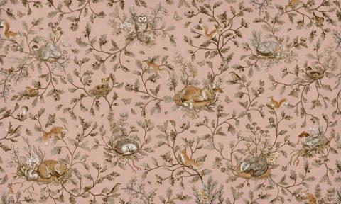 Woodland animals — rabbits, foxes and birds — dotted through leaves and berries in a fine all-over pattern. Shown in a softened vintage pink palette. Warm and storybook, it is a wall a child grows into.