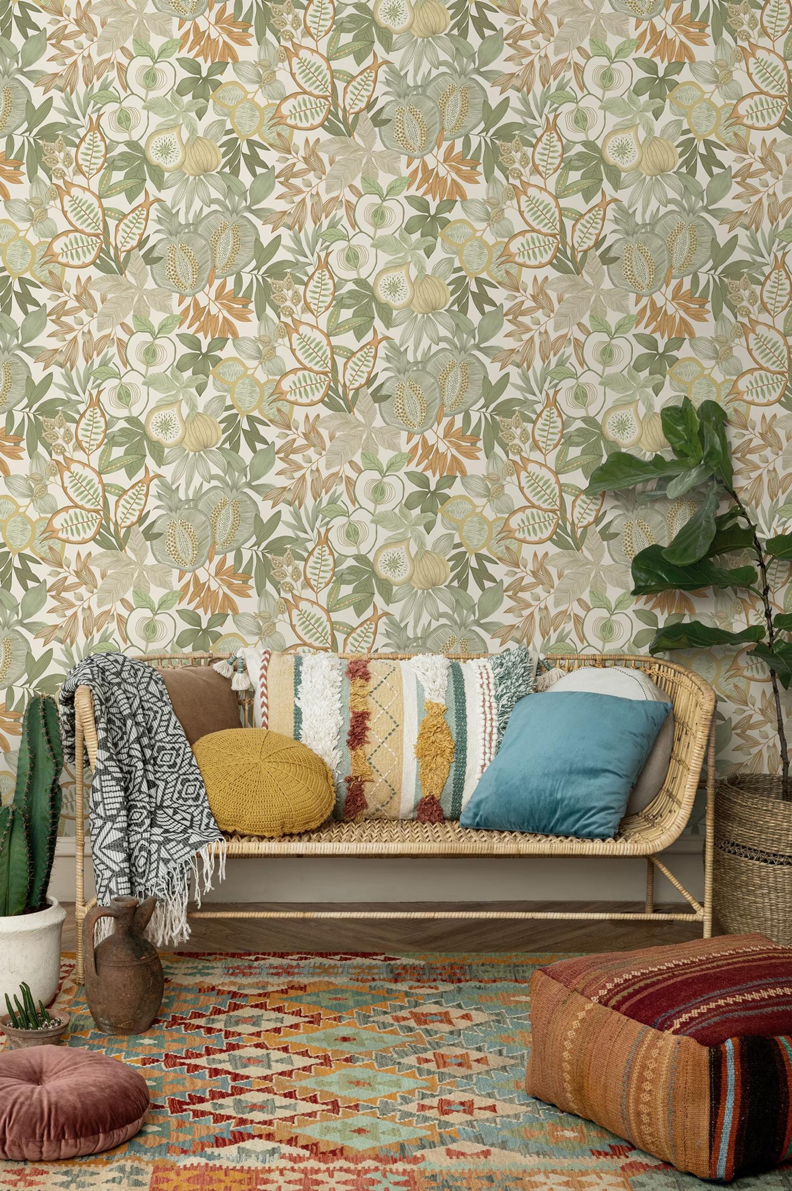 Nagano Green Orange wallpaper behind a rattan bench