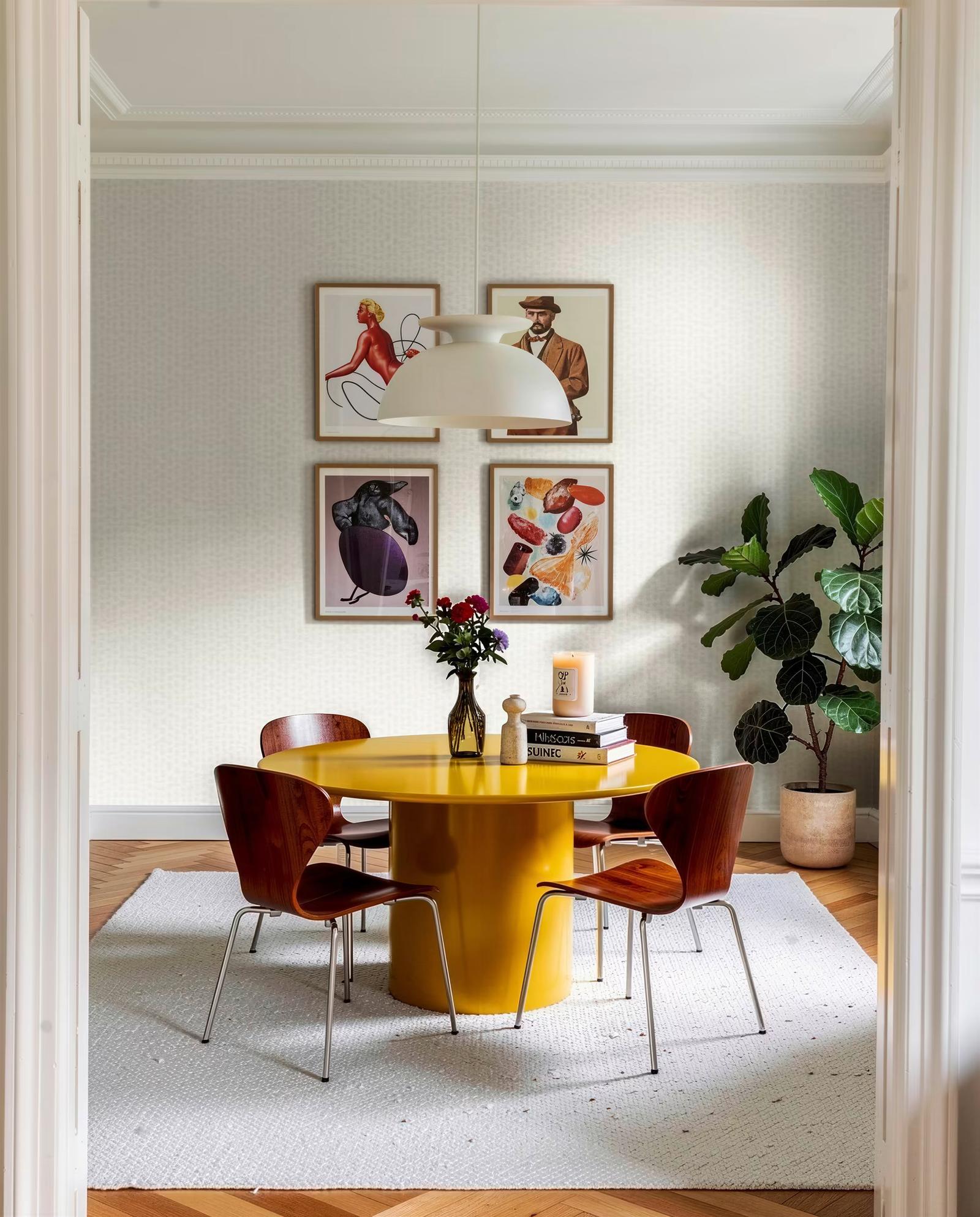 Grey Leopard wallpaper in a dining room with a yellow table