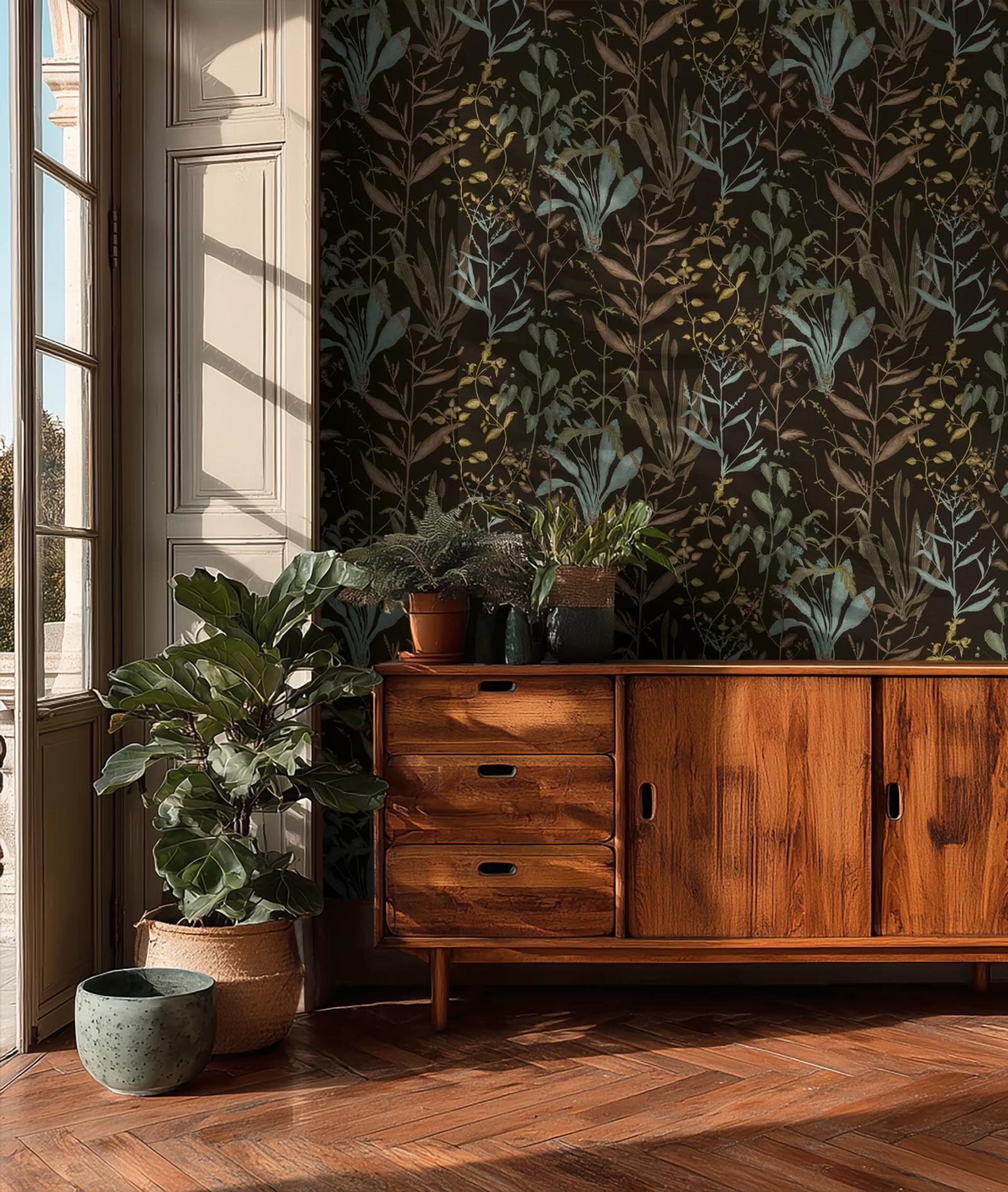 Midnight Herbarium wallpaper behind a teak sideboard and plants