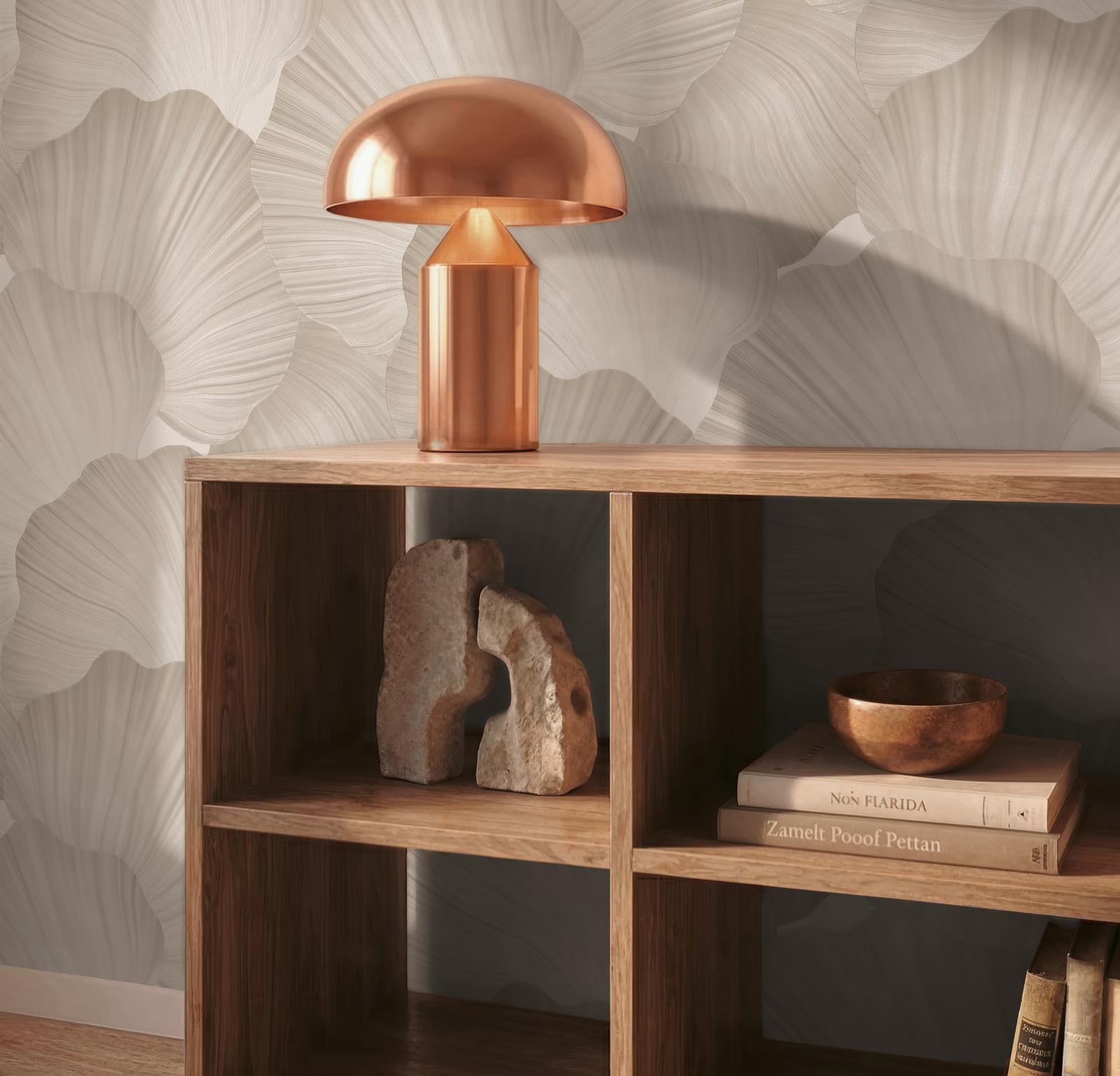 Cream Leaves relief wallpaper behind oak shelving and a copper lamp