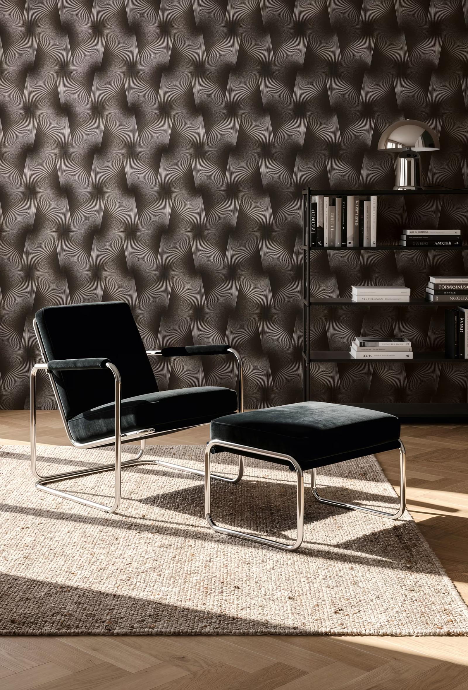 Black Fan wallpaper behind a black leather and chrome armchair