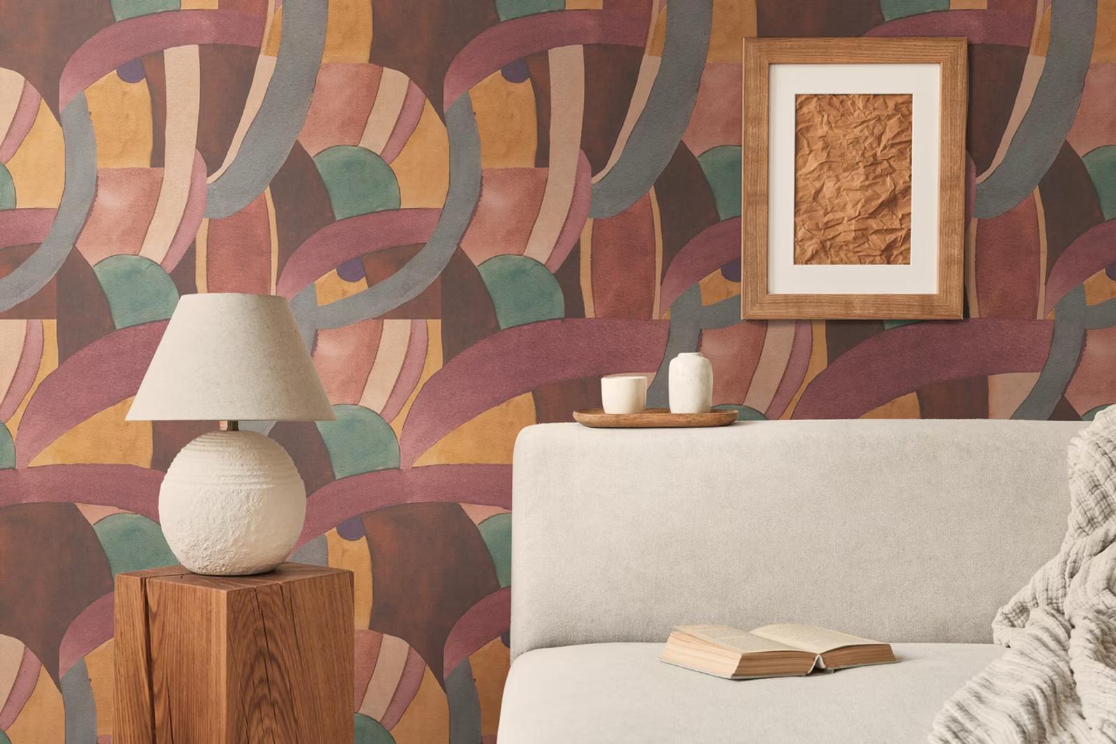 Berry Ribbons wallpaper above a sofa with a framed print