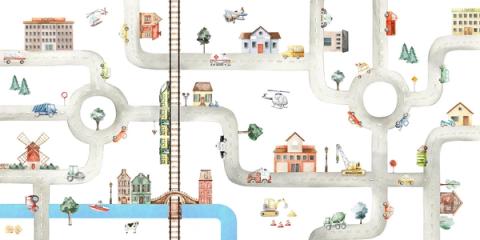 A town seen from above, with roads, a railway and busy little vehicles to follow.