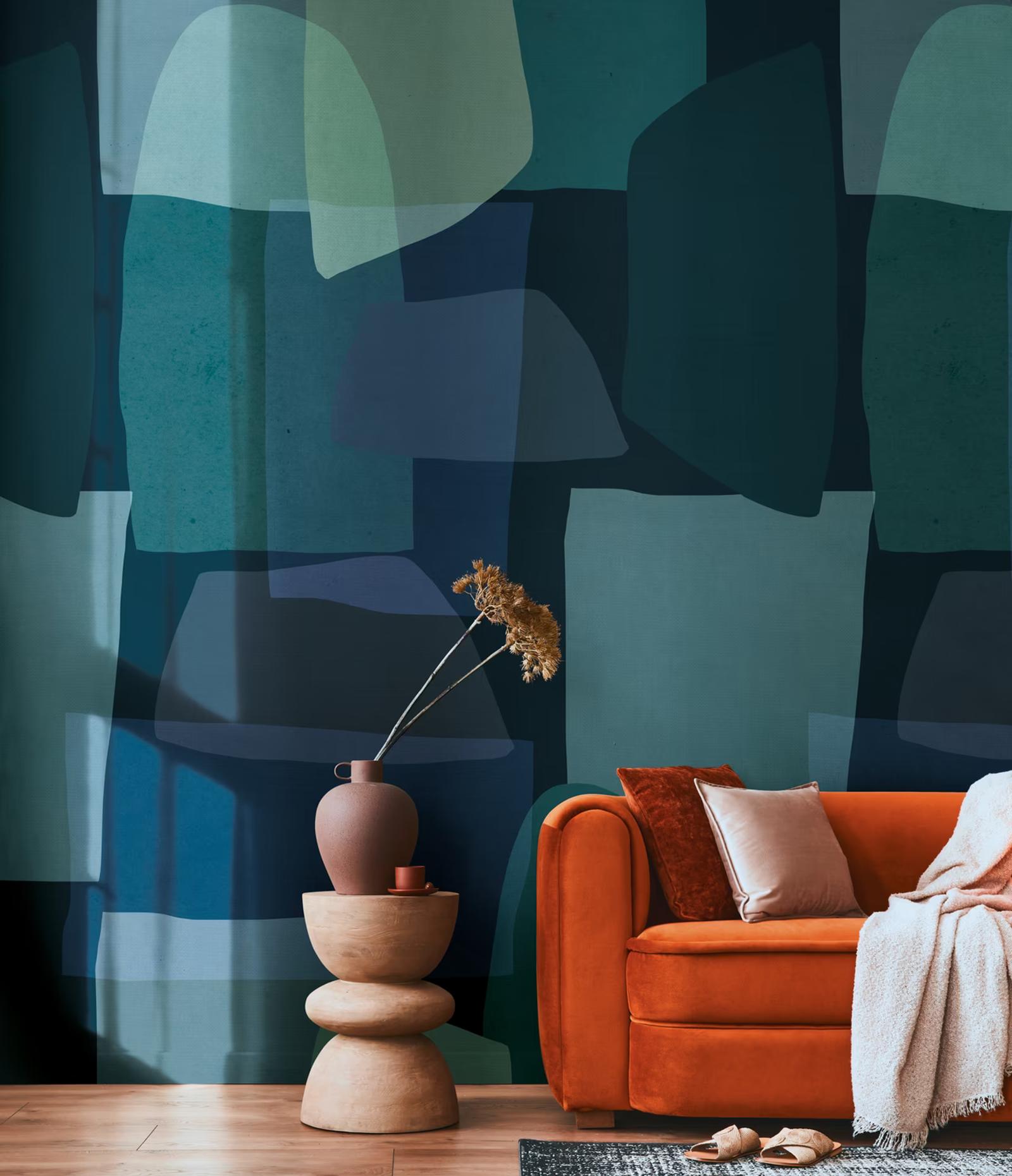 Teal Mosaic wall panel behind a burnt-orange velvet sofa