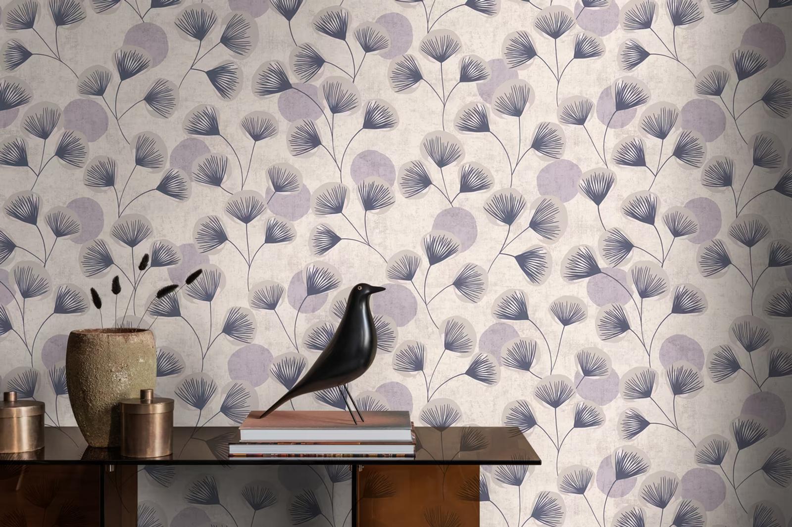 Lilac Fan Bloom wallpaper behind a desk with a black bird ornament