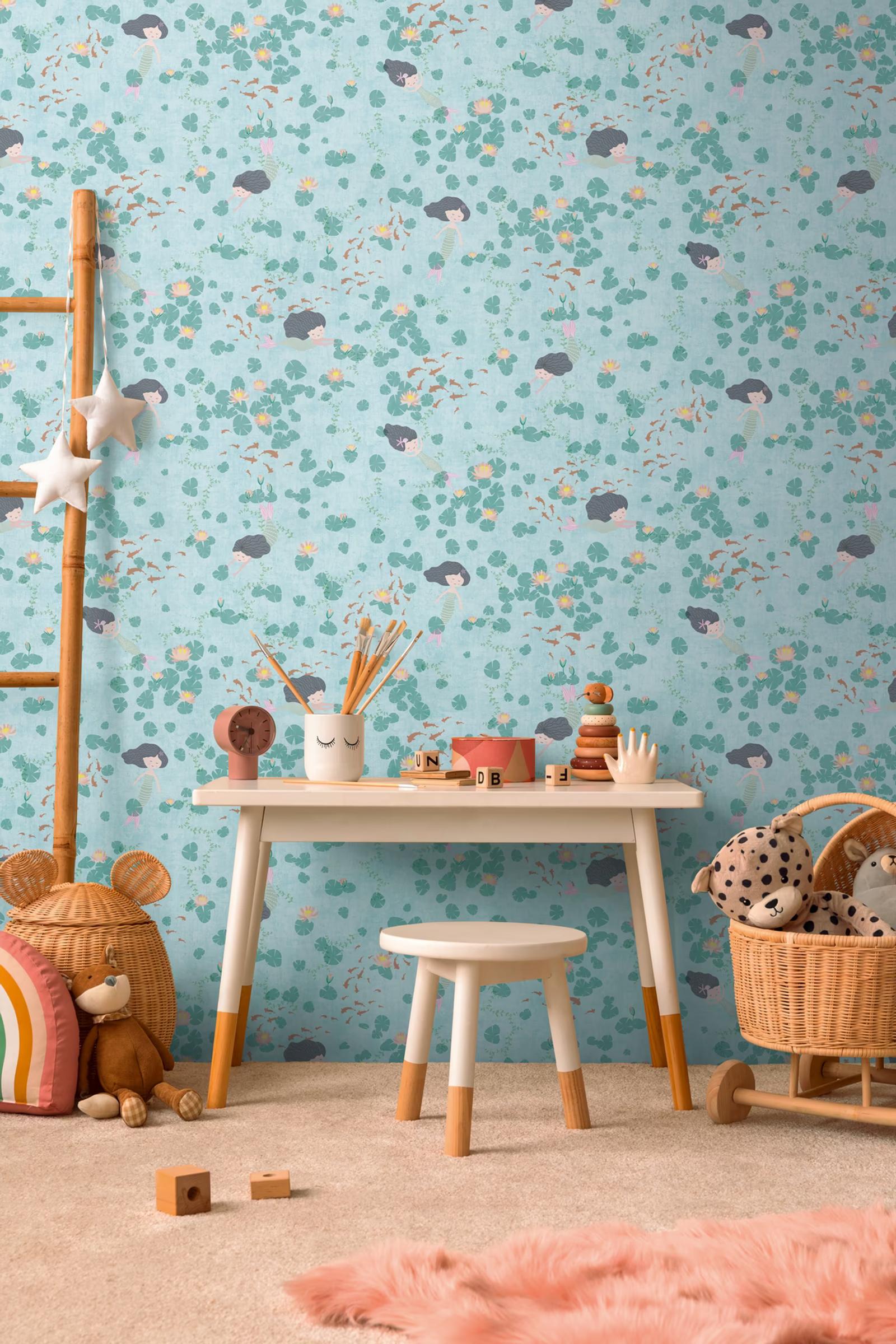 Mermaid Lagoon wallpaper behind a child's play table