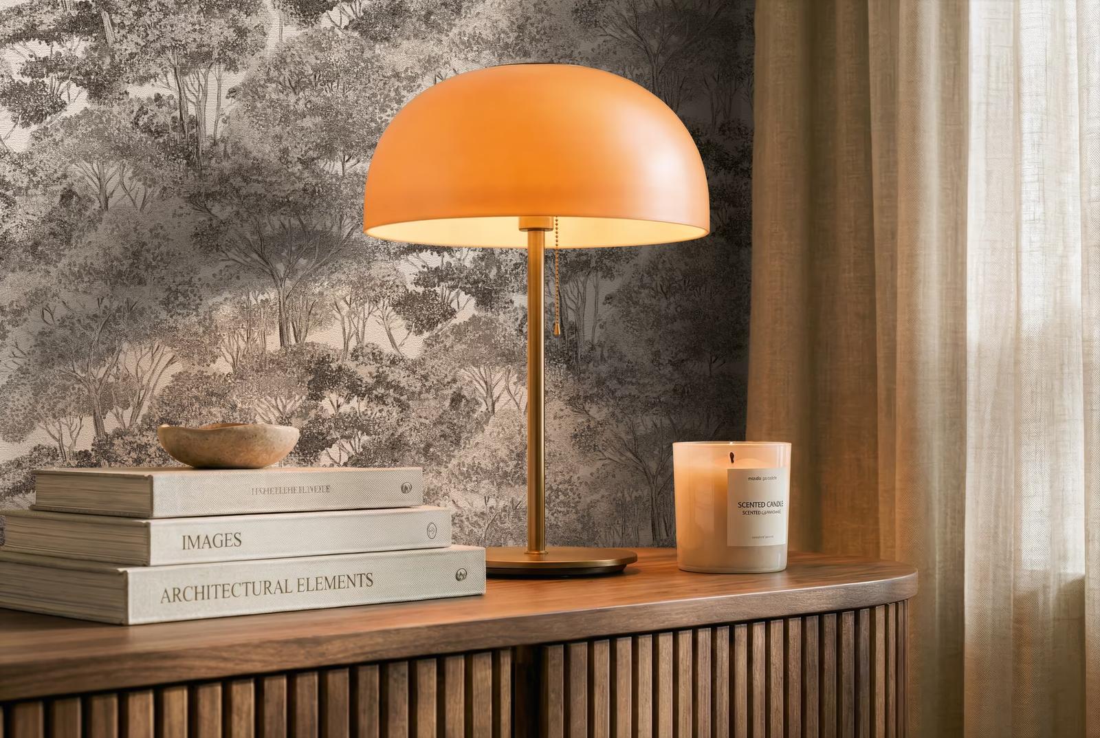 Trend Spectrum forest wallpaper behind a fluted sideboard with a copper lamp