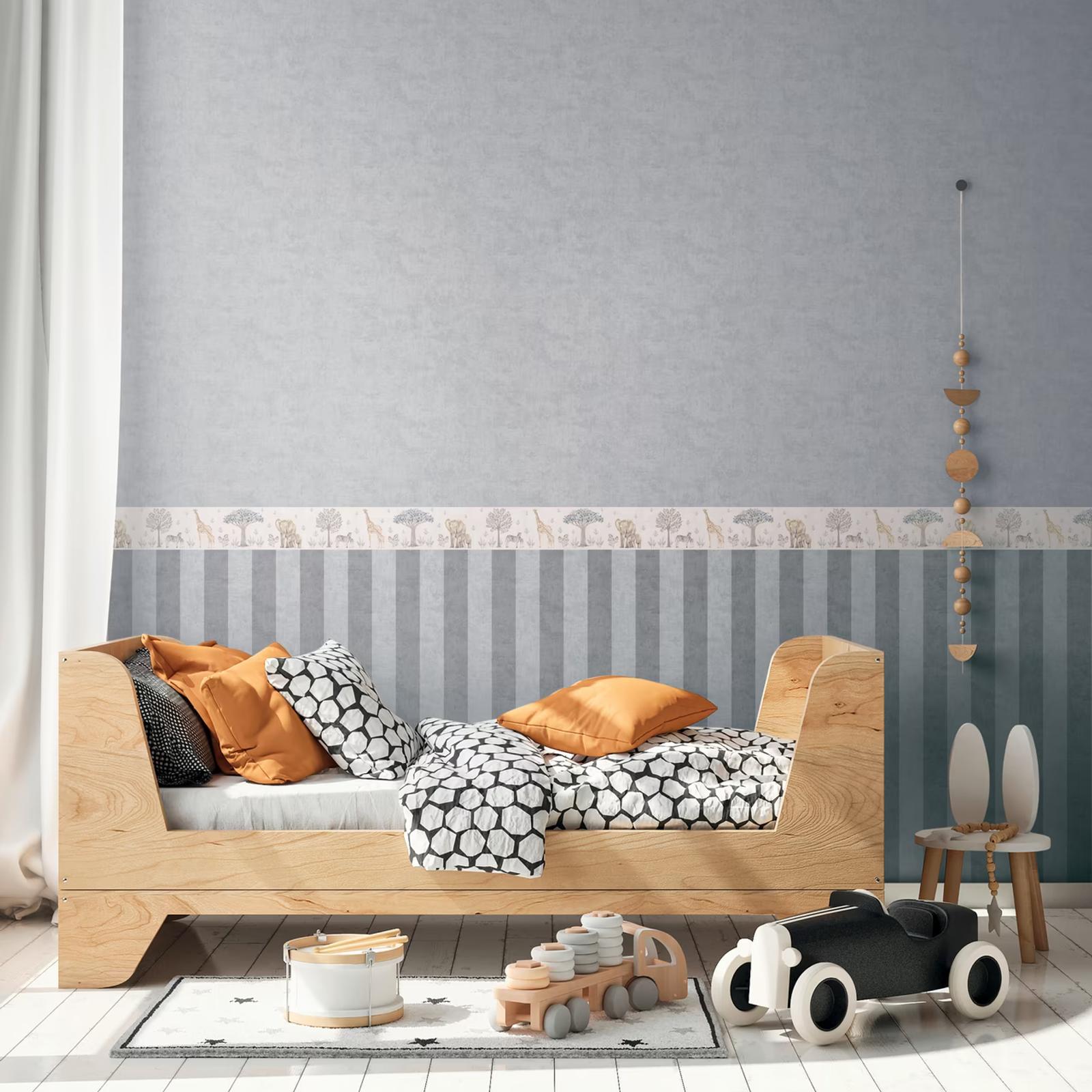 Safari border over a striped dado in a child's bedroom