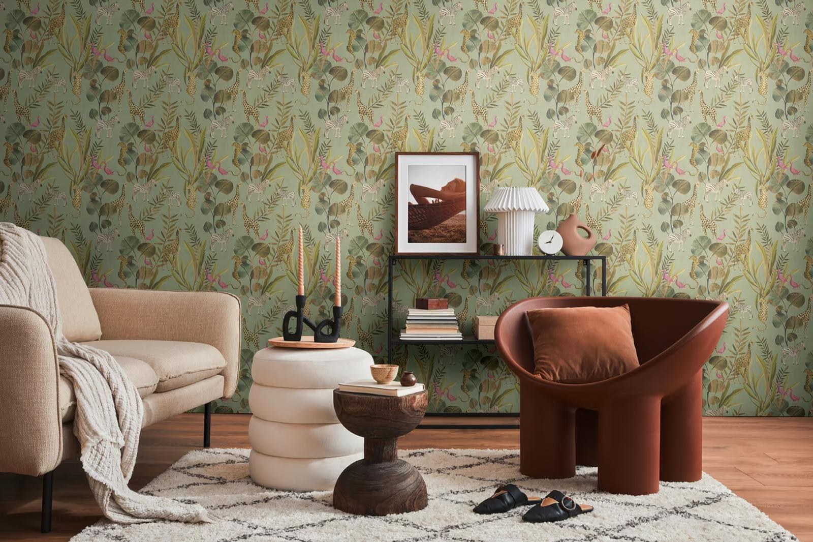 Green Safari wallpaper in a living room with a terracotta armchair