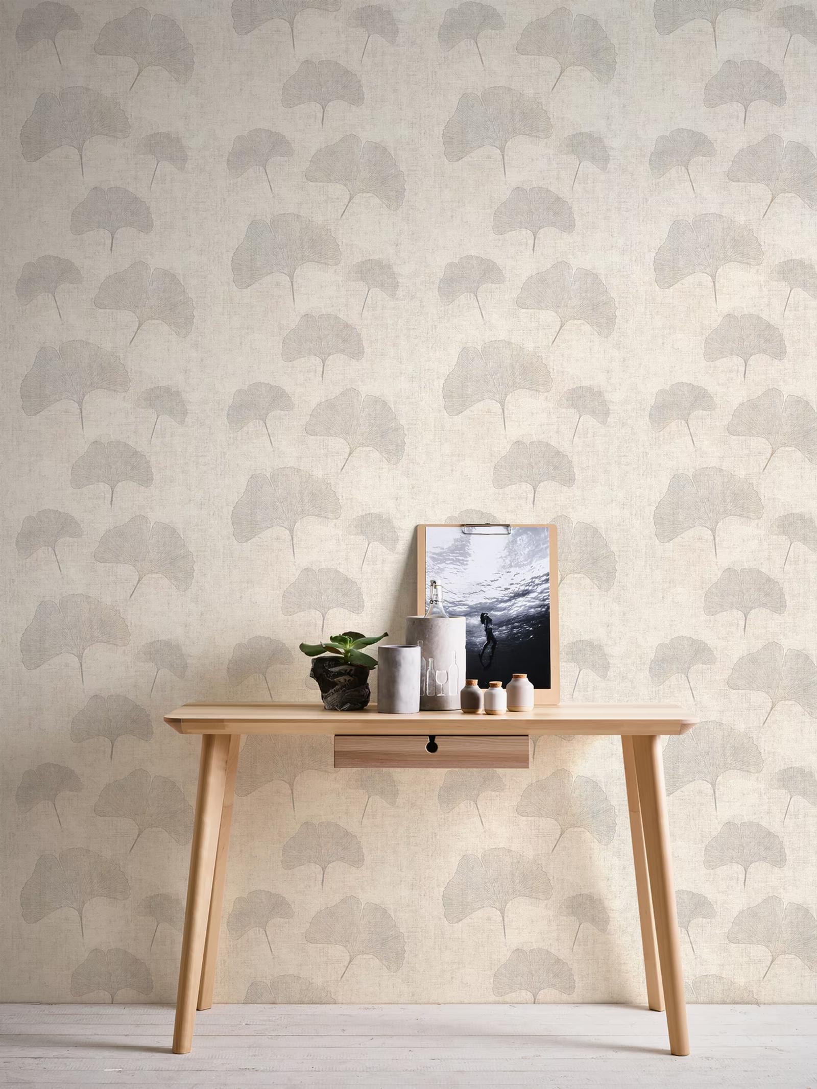 Silver Ginkgo wallpaper above a pale oak console table