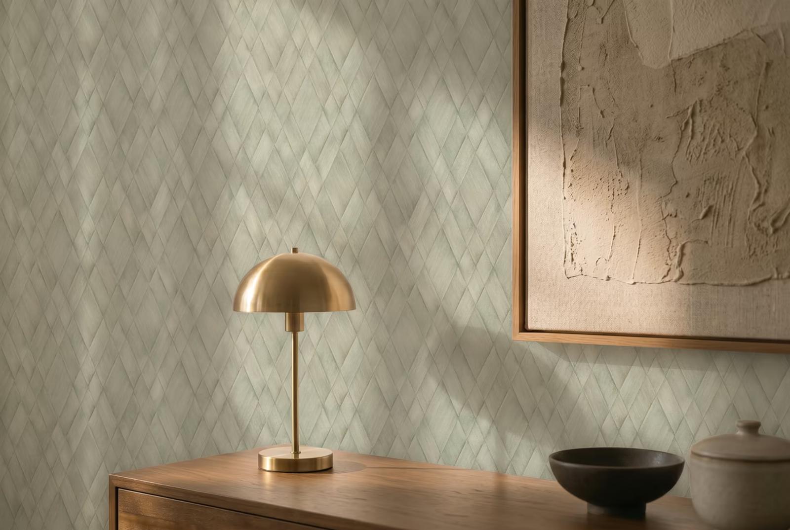 Olive Plait woven wallpaper above a wooden desk with a brass lamp