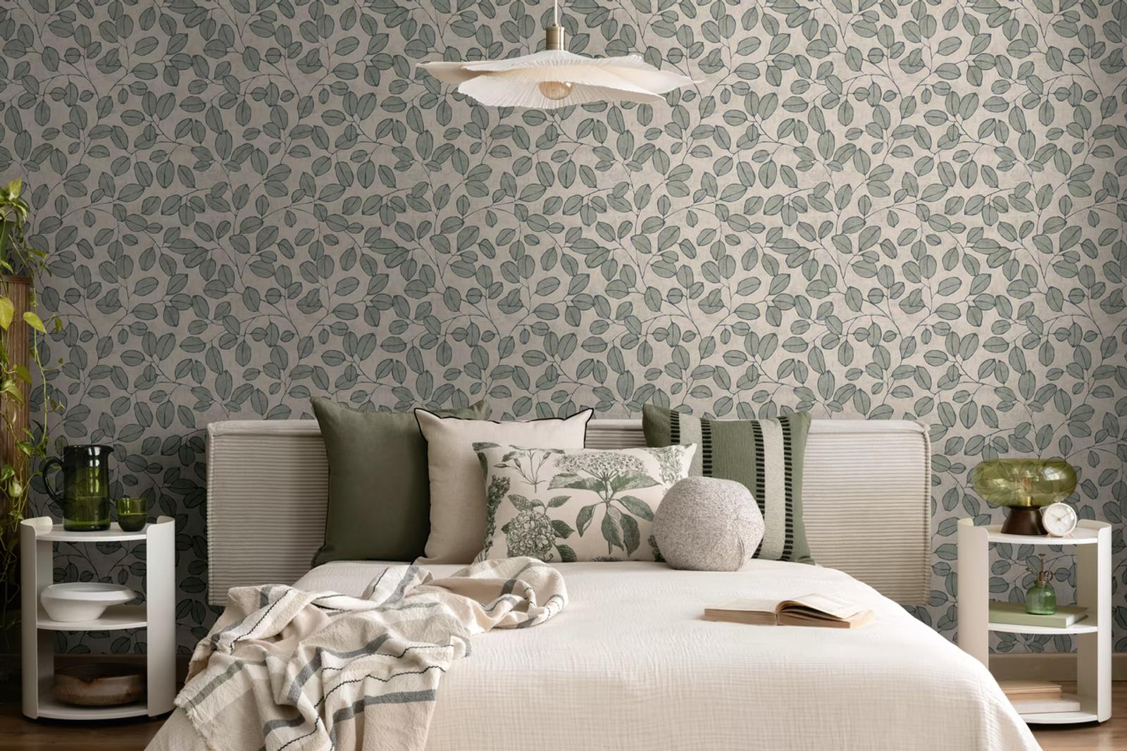Green Eucalyptus wallpaper in a bedroom with olive cushions and a paper pendant