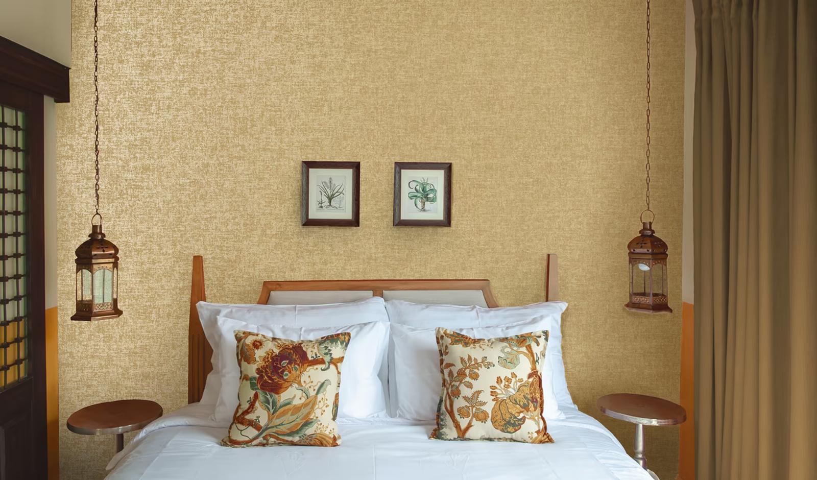 Ajanta Gold textured wallpaper in a bedroom