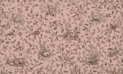 Woodland animals — rabbits, foxes and birds — dotted through leaves and berries in a fine all-over pattern. Shown as a single-tone print in dusky pink. Warm and storybook, it is a wall a child grows into.