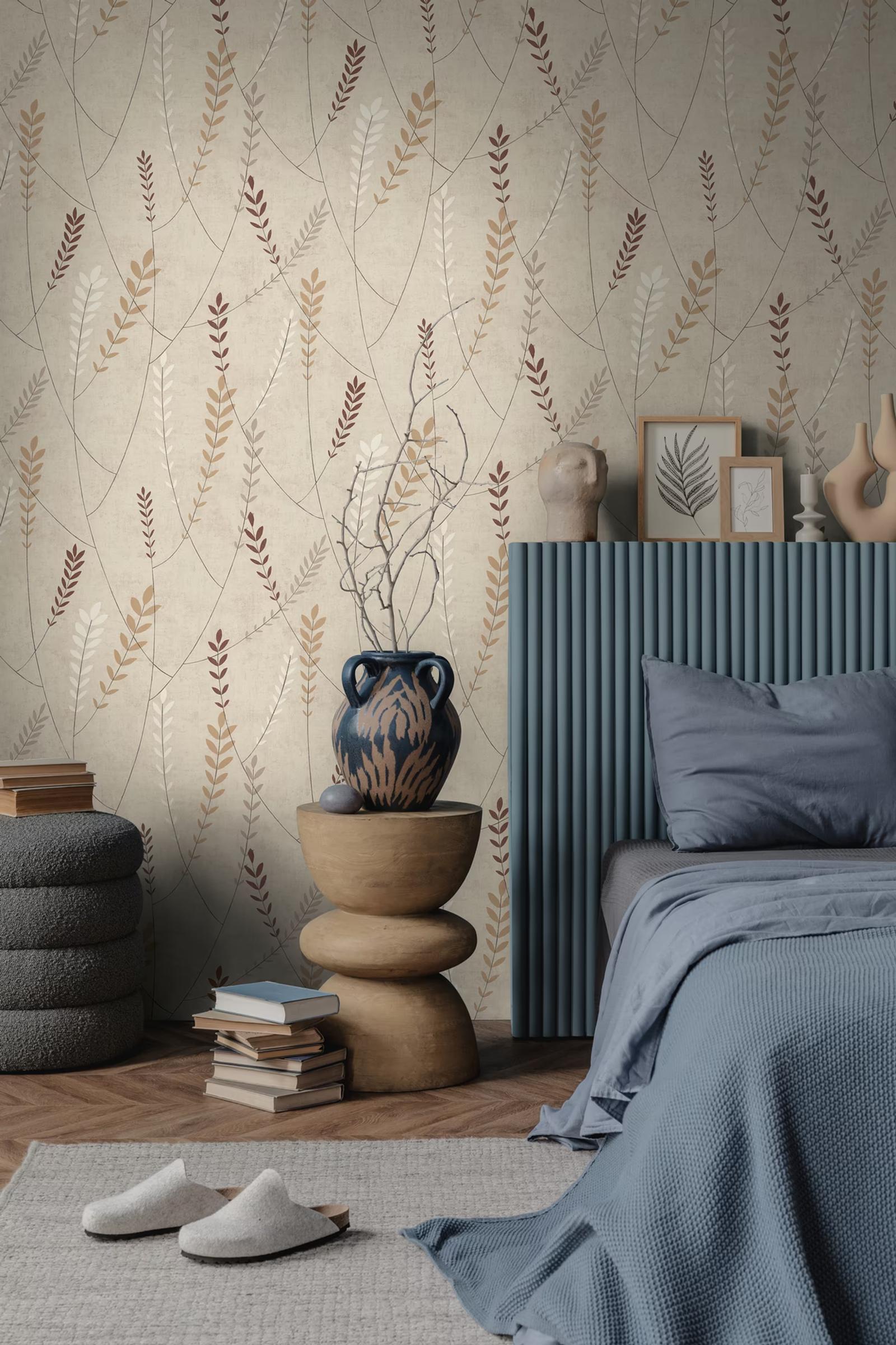 Sand Sprig wallpaper in a bedroom with a fluted headboard and stacked books