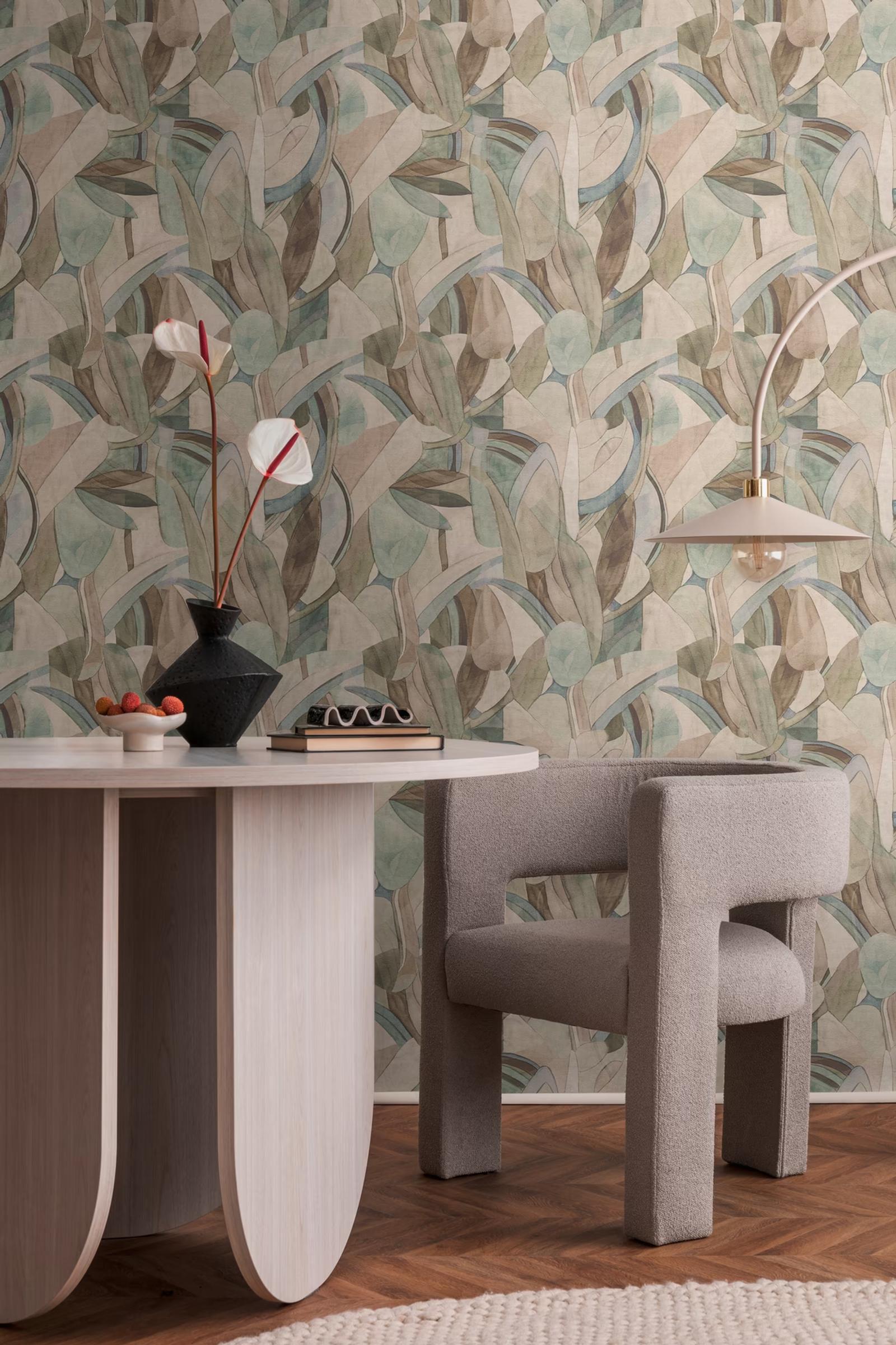 Driftwood Leaves wallpaper behind a pale console and dining chair