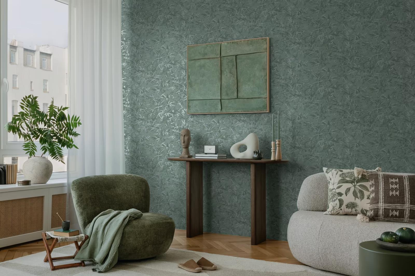 Forest Bamboo wallpaper behind a green bouclé armchair