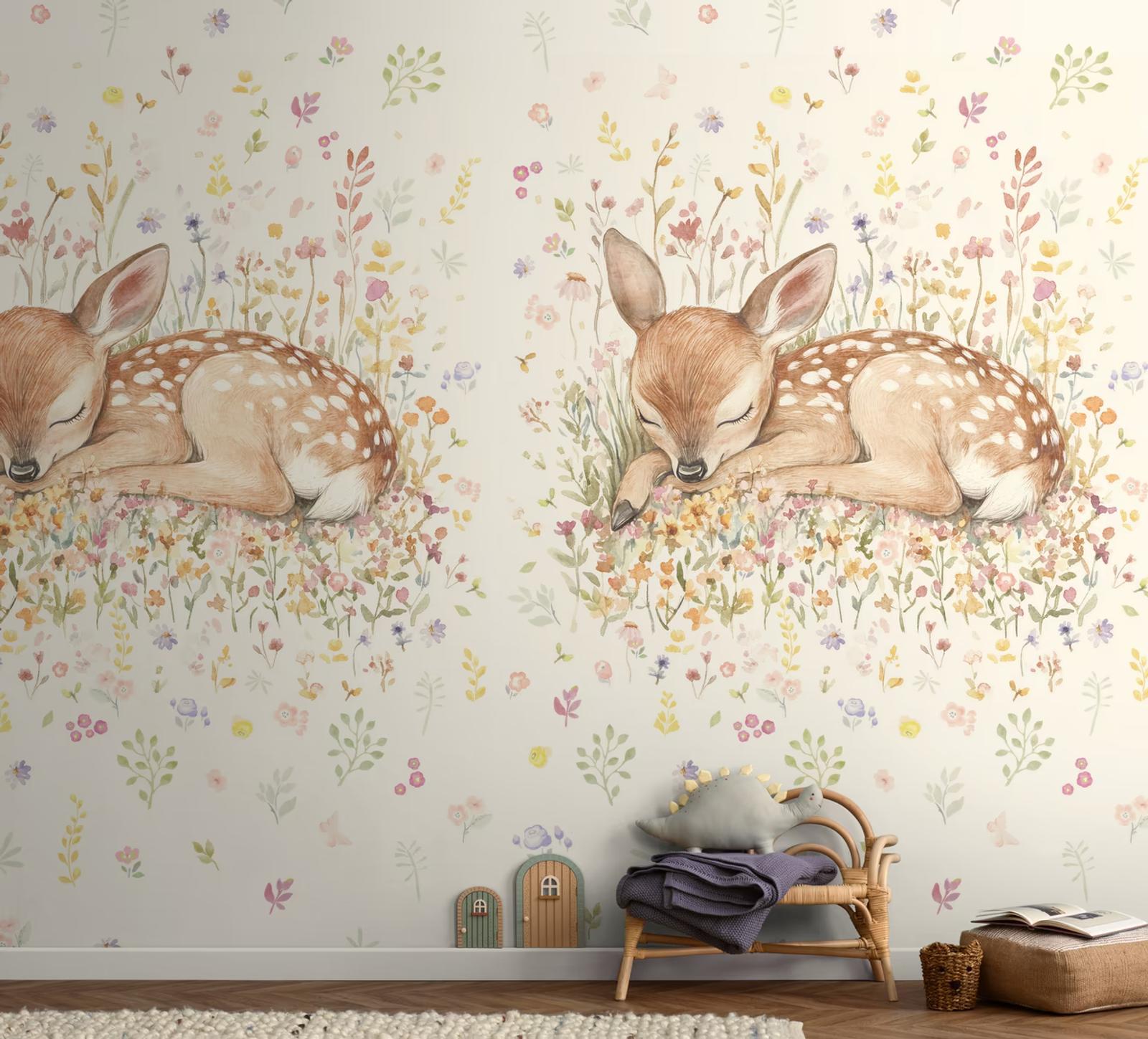 Sleeping Fawn wall panel above a rattan nursery chair