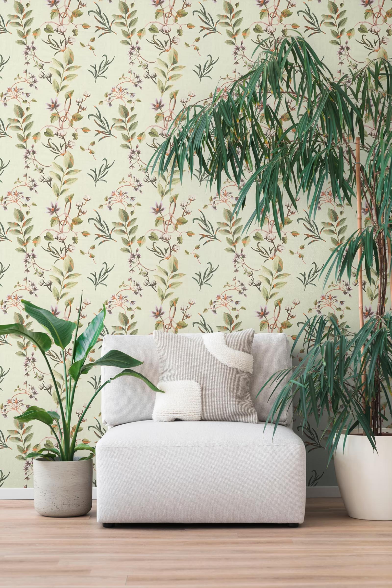 Mint Cotton Flower wallpaper in a plant-filled corner with a white sofa