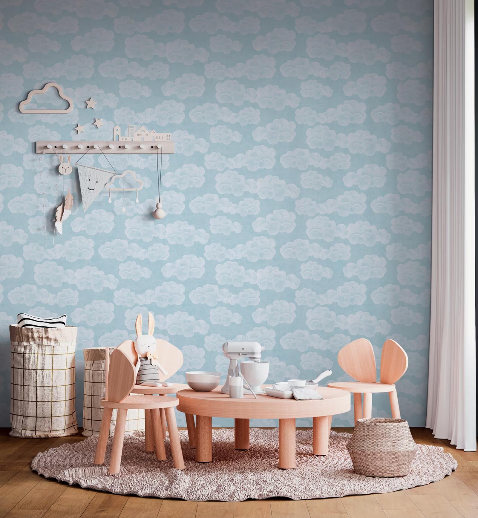 Blue Clouds wallpaper in a playroom with bunny-eared chairs