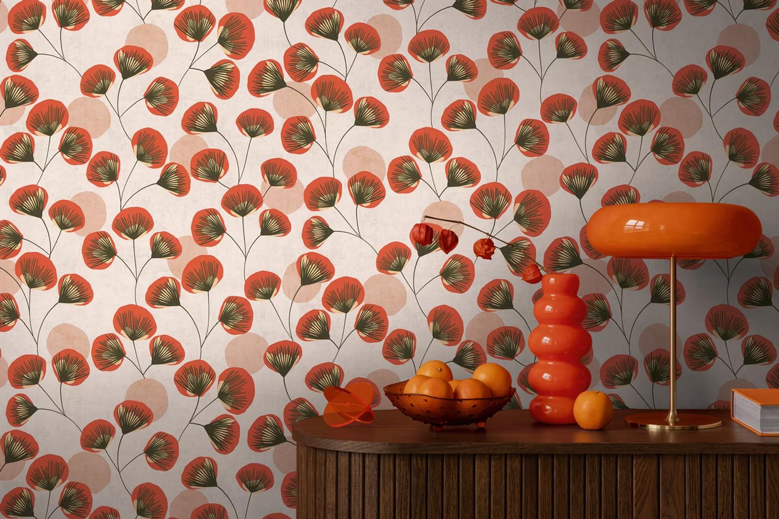 Scarlet Fan Bloom wallpaper in red above a sideboard with a bowl of oranges