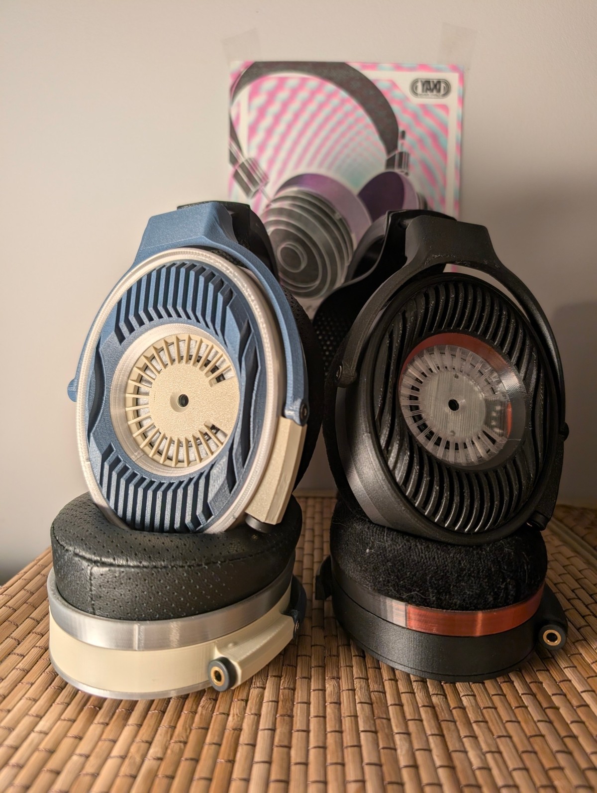 Blue-and-ivory and black Satyr 4 builds side by side, grilles facing the camera